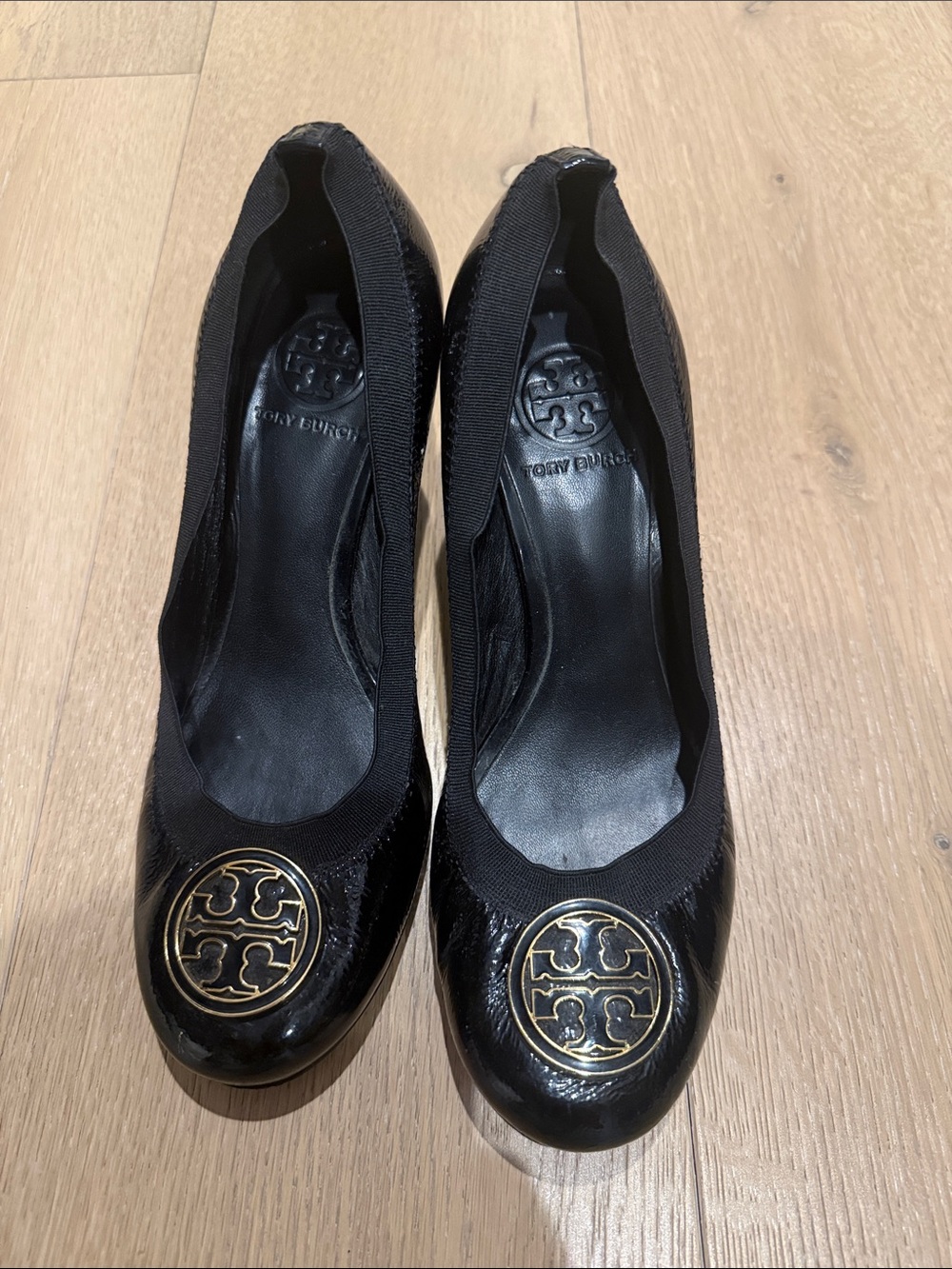 Tory Burch Black Patent heels with Gold Logo Medallion